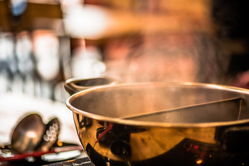 Shabu-shabu is a Japanese nabemono hotpot dish of thinly sliced meat and vegetables boiled in water. The term is onomatopoeic, derived from the sound emitted when the ingredients are stirred 