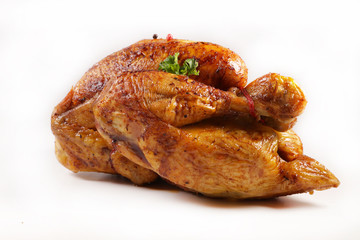 baked chicken and herb isolated on white background