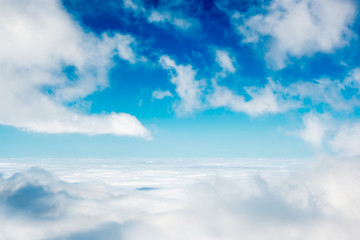 White clouds on the blue sky as nature background