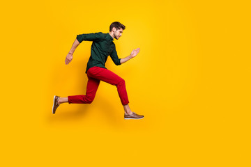 Fototapeta na wymiar Full length body size profile side photo of serious confident man aspiring forward to win contests of running jumping isolated bright color background