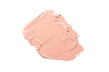 Smear paint or cream isolated on white background.