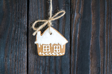 Christmas gingerbread of different kinds on a black and white wooden background
