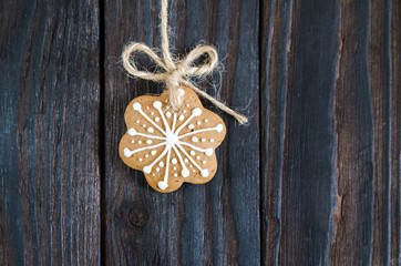 Christmas gingerbread of different kinds on a black and white wooden background
