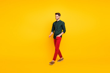 Fototapeta na wymiar Full size photo of elegant guy have fun on spring weekends go feel satisfied enjoy vacation wear casual style outfit isolated over bright color background