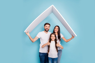 Portrait of beautiful three people mom dad school kid with brown hair hold roof move comfort cozy...