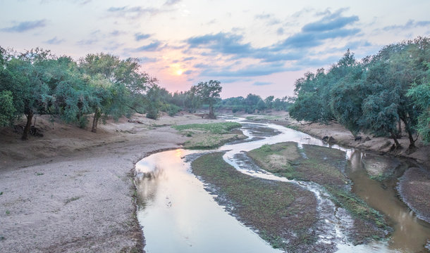 Dawn over the Luvuvhu river in northern Kruger National Park in South Africa image with copy space in horizontal format