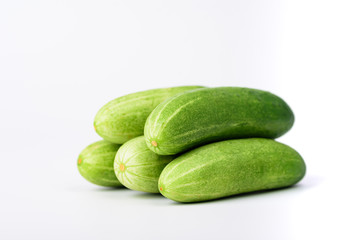 Fresh cucumber on white background
