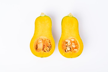 Half butternut squash on white background