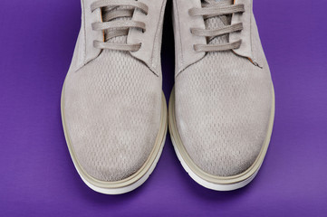 Close up of gray man pair shoes