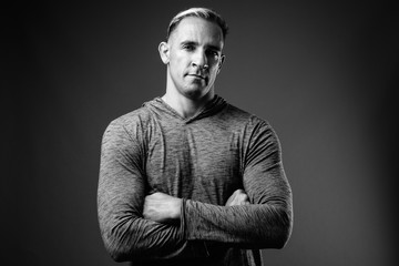 Studio shot of muscular man in black and white