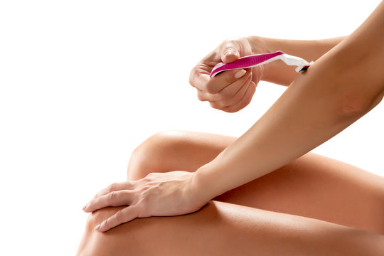 Woman Shaving Her Arms On White Background