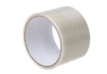 A roll of adhesive tape, close-up on a white background isolated