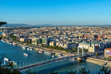 Fototapeta premium Budapest, Hungary - October 01, 2019: Panoramic cityscape view of hungarian capital city and Danube river of Budapest from the Gellert Hill.