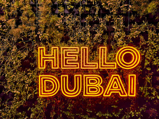 HELLO DUBAI Neon cool text welcoming people ti Dubai city