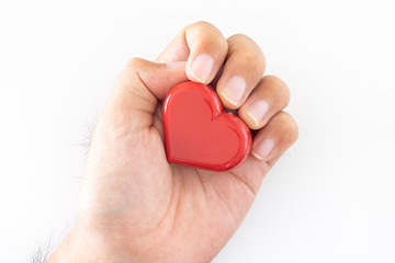 Fototapeta premium ハートを持つ男性の手