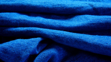 folds of blue fleecy fabric