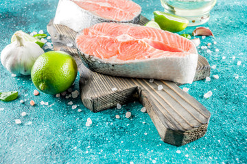 Raw salmon fish steaks with spices
