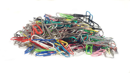 bunch of multicolored paper clips on white background
