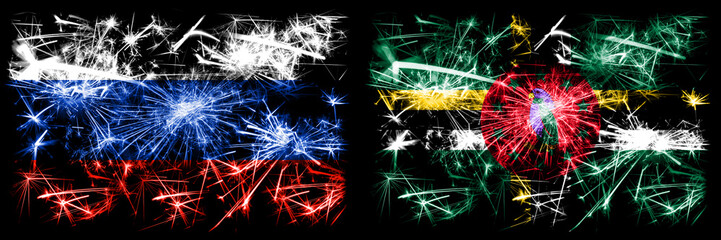 Russia, Russian vs Dominica New Year celebration sparkling fireworks flags concept background. Combination of two states flags
