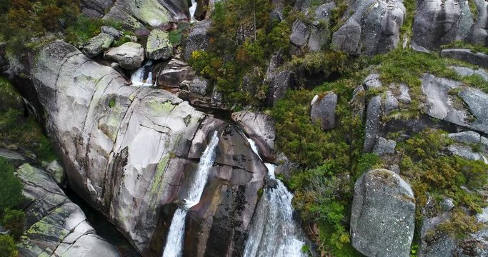 Aerial view of a cascade near the traditional village of Castro Laboreiro, at the Peneda Geres National Park, in Portugal