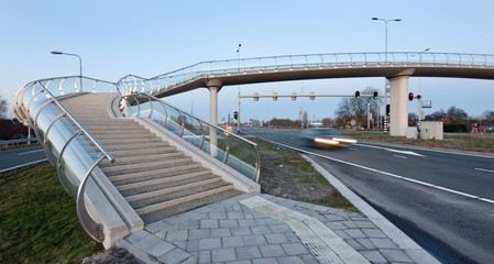 Glass pedestrian bridge Barendrecht Netherlands. Stairs.