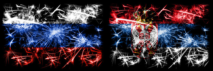 Russia, Russian vs Serbia, Serbian New Year celebration sparkling fireworks flags concept background. Combination of two states flags