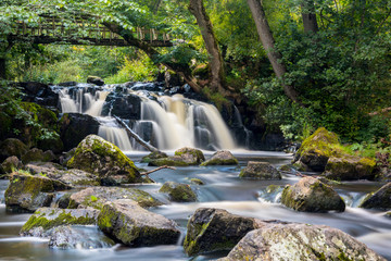 Hallamolla waterfall Sweden long exposure shot beautiful softness and rocks in water