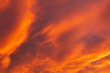 Fototapeta na wymiar Dramatic fiery sky sunset cloudscape at dusk