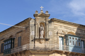 Fototapeta na wymiar Corner of a residential building on the island of Gozo.