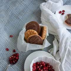 Tasty homemade biscuits with chocolate and pomegranate