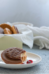 Tasty homemade biscuits with chocolate and pomegranate