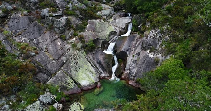Aerial view of a waterfall near the village of Castro Laboreiro, at the Peneda Geres National Park, in Portugal
