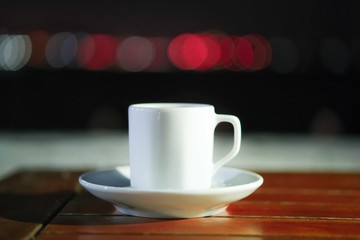 Cup of coffee in the night.