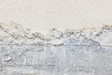 Obraz na płótnie Canvas Concrete wall texture background. Natural stones. Building's facade decor. Decorative plaster. House exterior. 