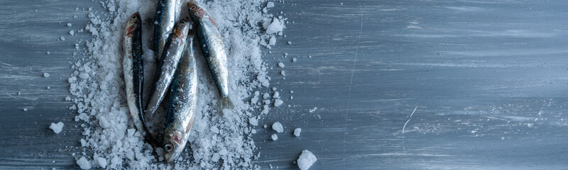 Preparing anchovies in salt. Healthy raw seafood