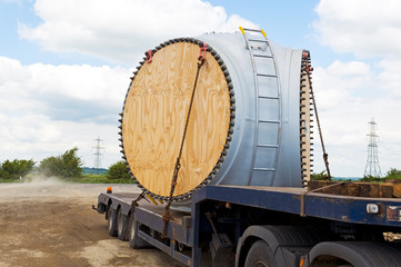 A low loader lorry delivering the hub of a wind turbine
