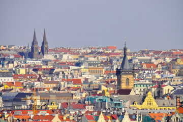 Naklejka na ściany i meble Panoramic view of Old Town in Prague in a beautiful summer day. Top view to colorful roofs skyline of capital city Prague, Czech republic. 