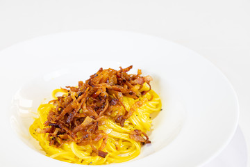 Carbonara pasta, spaghetti with pancetta, egg, hard parmesan cheese and cream sauce. Traditional italian cuisine. Pasta alla carbonara - Immagine