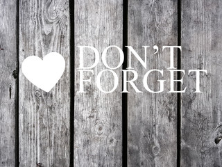 Do not forget. Old wood background. Valentine's card.