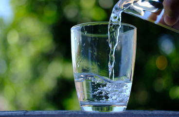 glass of water on counter background