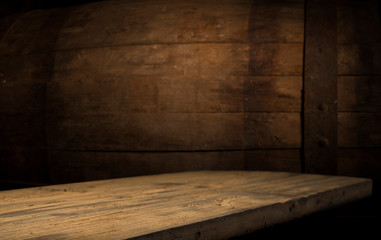 Old wooden barrel on a brown background