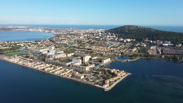 Large aerial view of Sete ile de Thau along the mediterranean sea France