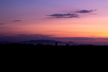 Silhouette of mountain and the pink sky in the morning