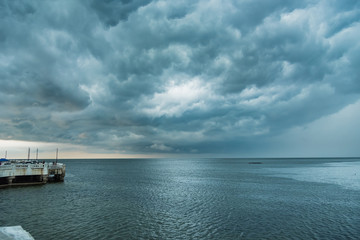Chon Burii, Thailand - October, 06, 2019 : Storm is coming, Rain clouds before the storm in tropical sea landscape at Chon Burii, Thailand.