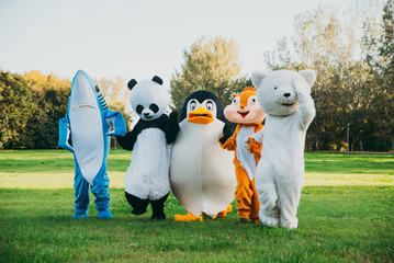 Group of animals mascots doing party