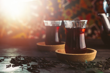 turkish tea on wooden table - obrazy, fototapety, plakaty