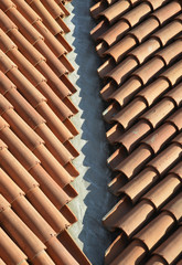 roof with red tiles on background