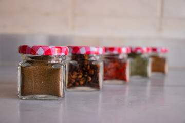 Various spices in the little jars