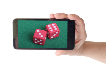 Dice and smartphone on white background