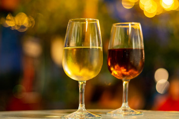 Christmas sherry wine, dry or sweet jerez fortified wine in glasses and street lights, Jerez de la Frontera, Andalusia, Spain